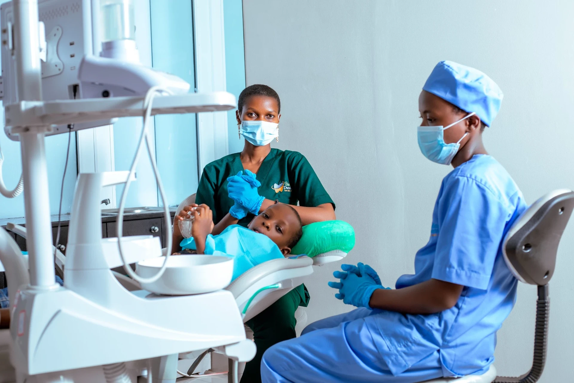 Urban Dental Clinic team treating a child in the dental chair